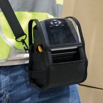 Universal holster allowing safe transportation of a mobile printer while maintaining access to buttons and paper output.